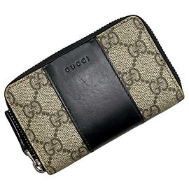Portamonete Gucci in beige e nero