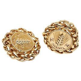 Brincos de pressão Chanel Coco Mark motivo caule de arroz banhados a ouro