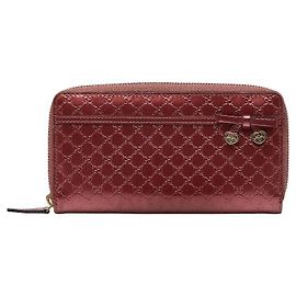 Portafoglio lungo Gucci Micro Guccissima con cuore in nastro