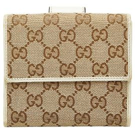 Cartera bi-fold Gucci GG Canvas