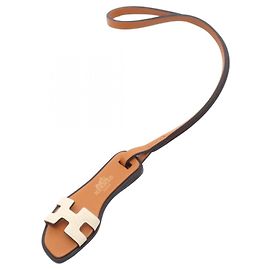 Hermès Acessório Charm Hermes Oran Nano Natural Sable Nata