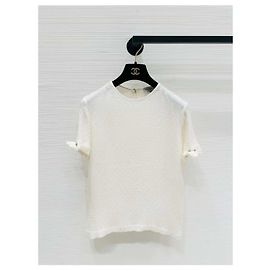 Top Chanel Metiers d'Art in Tweed Bianco Camelia