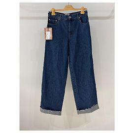 Pantaloni in denim Miu Miu