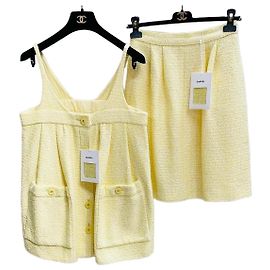 Gonna Chanel in tweed giallo con paillettes