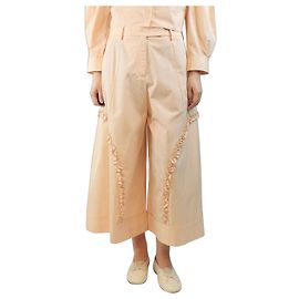 Simone Rocha Pantalones anchos esculpidos color melocotón - size UK 12