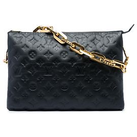 Louis Vuitton Coussin MM in pelle di agnello imbottita nera con monogramma impresso