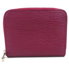Porte-monnaie Louis Vuitton en cuir Epi couleur Fuchsia