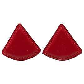 Boucles d'oreilles clips Triangle Hermès en cuir Swift doré