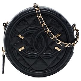 Bolso de mano redondo Chanel Caviar CC Filigree negro con cadena bandolera