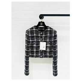 Giacca Chanel in tweed intrecciato a quadri multicolore