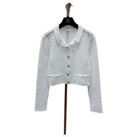 Chaqueta Chanel de Tweed Blanco con Logotipo de Camelia con Lentejuelas