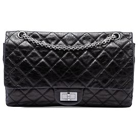 Bolso de hombro Chanel Reissue 2.55 Double Flap 227 de piel de becerro envejecida acolchada negra