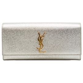 Autre Marque Clutch Cassandre Saint Laurent in pelle di vitello metallizzata oro