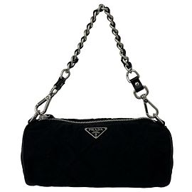 Pochette matelassée Prada avec logo triangle