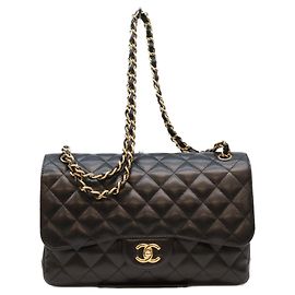 Sac à épaule Chanel Double Flap en cuir caviar noir