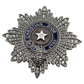 Spilla Christian Dior 1947 Signature BUFFALO STAR