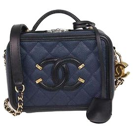 Chanel Piccola borsa vanity in pelle caviar matelassé blu navy e nera