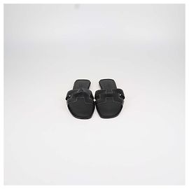 Hermès Hermes Oran Sandalen aus schwarzem Box Calf Leder