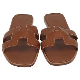 Hermès Sandales Oran Hermes en cuir Box Calf Gold