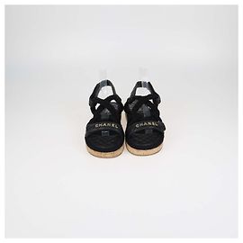 Sandali bassi Dad in pelle matelassé nera e corda Chanel
