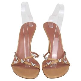 Sandali slide Debora Amina Muaddi in pelle dorata con cristalli a farfalla