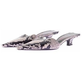 Autre Marque Mules em couro efeito serpente "Gigio"