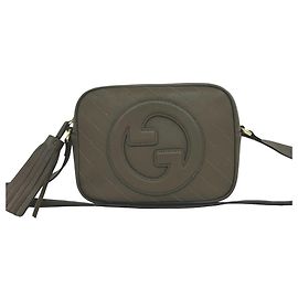 Borsa a tracolla e pochette in pelle GUCCI Blondie con G intrecciate e nappina