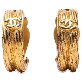 Orecchini a cerchio a clip Chanel Gold CC placcati in oro