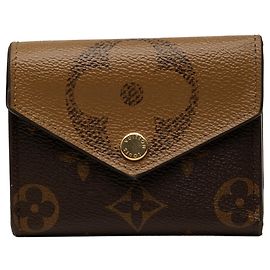 Louis Vuitton Monogram Giant Reverse Portefeuille Zoe Tri-fold Wallet