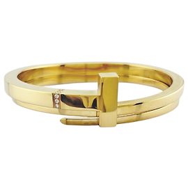 Autre Marque Bracciale rigido Tiffany & Co. T Square Wrap in oro giallo 18K
