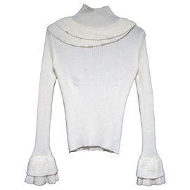 Autre Marque cygne Camisola de malha com gola alta e folhos