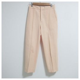 Autre Marque Pantaloni con cucitura frontale ed elastico posteriore