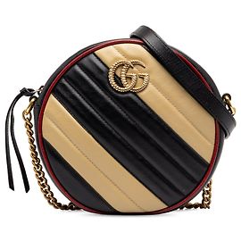 Borsa a tracolla rotonda Gucci Mini GG Marmont in pelle matelassé Torchon nera