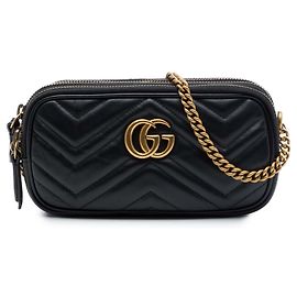 Borsa a tracolla Gucci Mini GG Marmont in pelle matelassé nera con tripla zip
