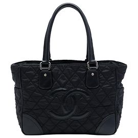 Bolso tote de nailon acolchado Chanel Paris New York negro