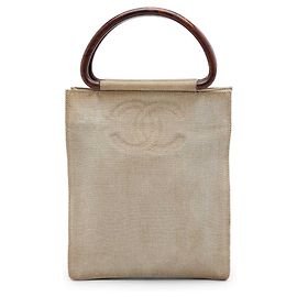 Borsa Tote Chanel CC in tela beige con manici in legno