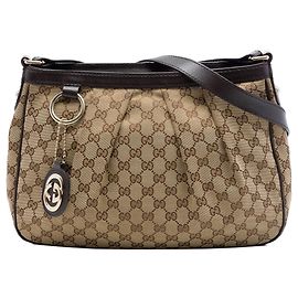 Sac crossbody Gucci GG Canvas Sukey beige