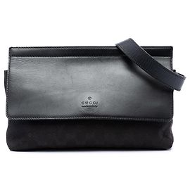 Borsetta a cintura Gucci in GG Canvas e pelle nera con fascia Web
