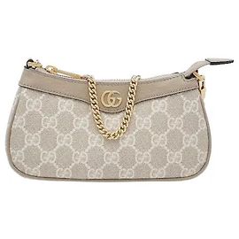 La mini borsa Ophidia armonizza l'iconico materiale in tela GG Supreme di Gucci con i dettagli della banda web. Realizzata in materiale di tela rivestita resistente a graffi e macchie, vanta una qualità eccezionale