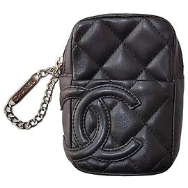 Chanel Mini Clutch em Couro Matelassê Preto