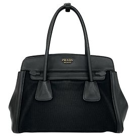 Bolso de mano Prada en cuero Saffiano y lona