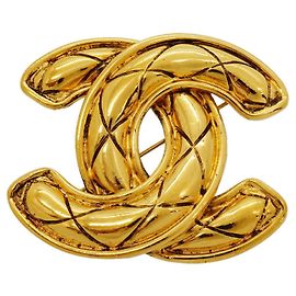 Broche Chanel banhada a ouro