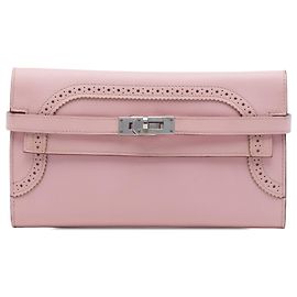 Portefeuille Hermès Kelly Longue Ghillies en cuir Swift Rose