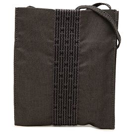 Bolso de mano Herline Hermès en lona gris