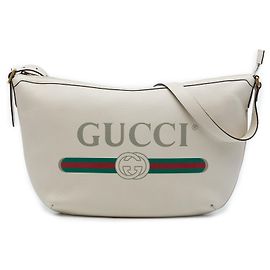 Bolso bandolera media luna Gucci en piel de becerro granulada marrón con logo
