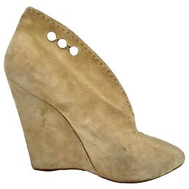 Botines de cuña Giuseppe Zanotti en ante beige