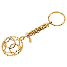 Llavero y colgante de bolso Chanel CC redondo chapado en oro