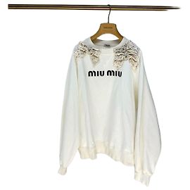 Pull en maille Miu Miu blanc en coton
