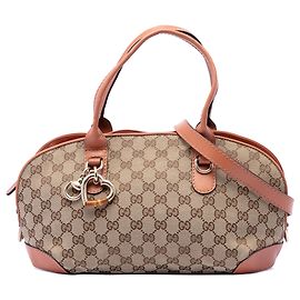 Borsa Satchel Gucci in tela GG beige con dettaglio Heart Bit