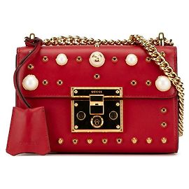 Bolso de hombro Gucci con cadena, tachuelas y candado